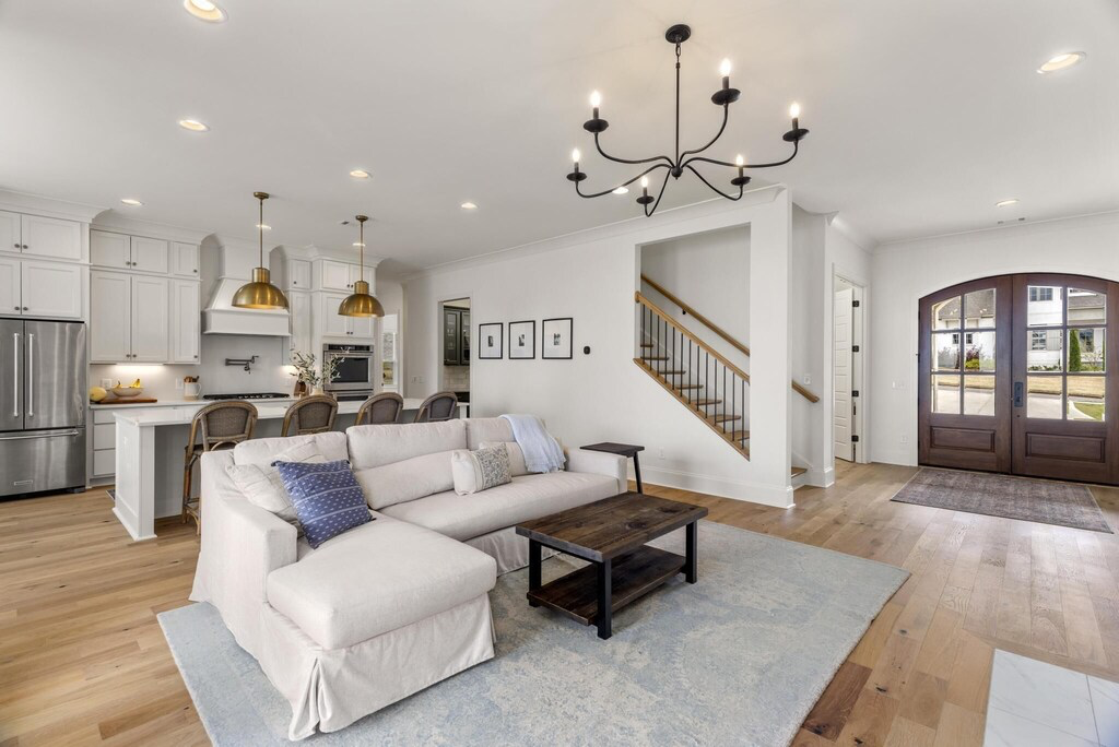 Living room seating area open to the kitchen