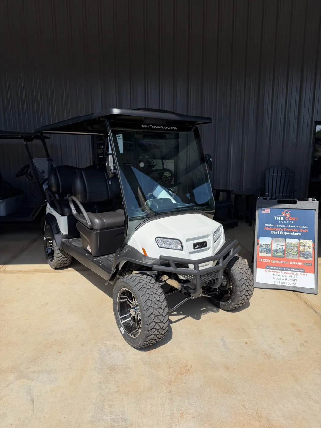 Lifted golf cart available to rent for guests staying at The Hydrangea House in Auburn, Alabama